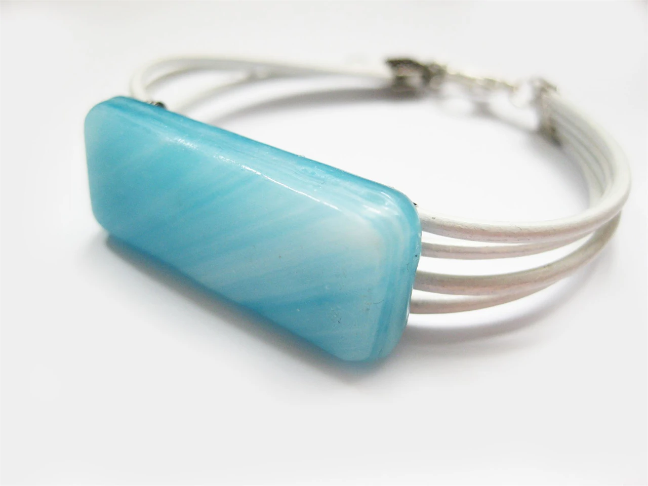 világoskék üvegékszer kakrötő