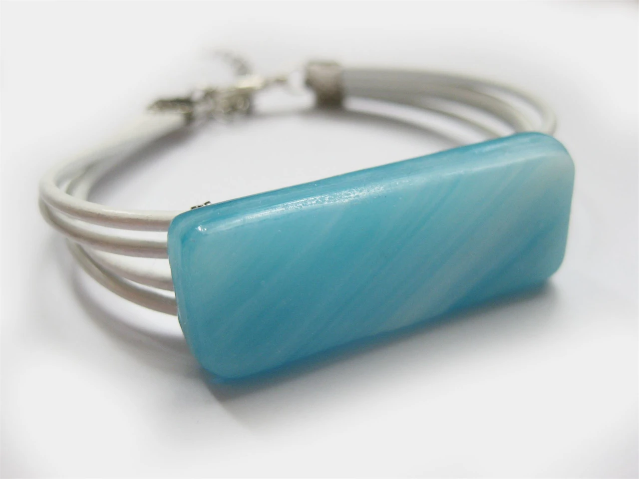 világoskék üvegékszer kakrötő